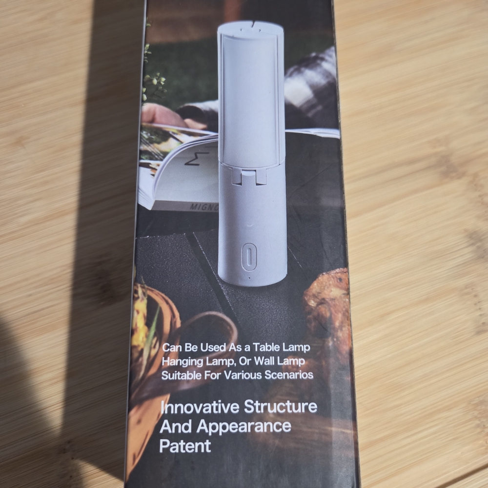 New Innovative White Table Lamp, Camping Lamp , Hanging Lamp. Etc. Charger